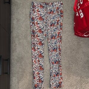 No Boundaries White Floral Print Pants with Orange and Blue Accents